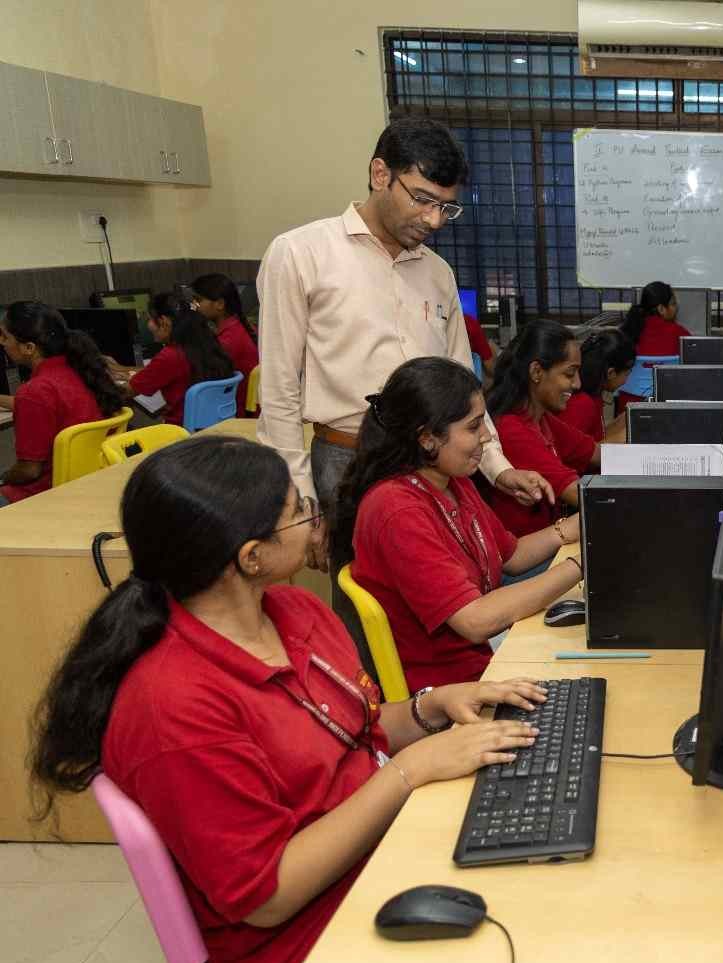 Students coding in the computer lab
